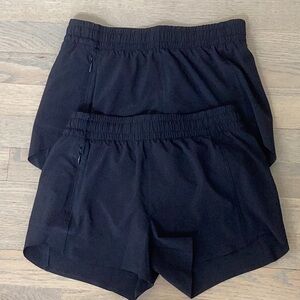 2 pairs of black athlete girls heart the hustle shorts